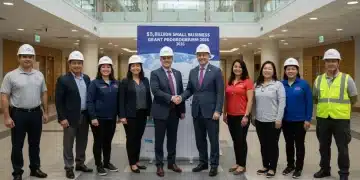 Small business owners engaging with a government official about the new $5 billion grant program.