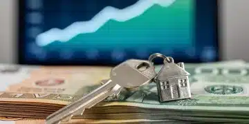 House key on Canadian dollars with rising interest rate graph in background, symbolizing mortgage decisions.
